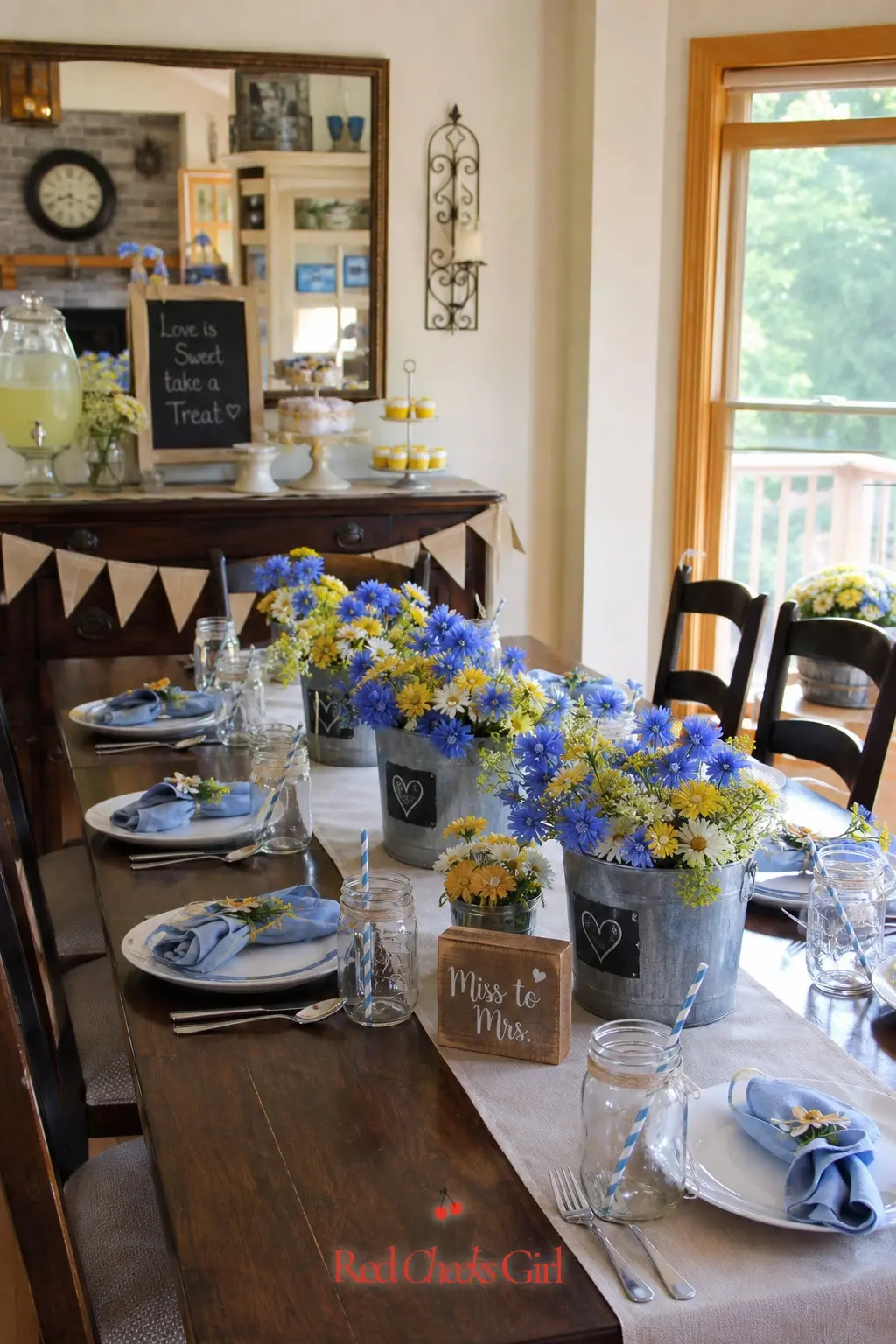 Galvanized Bucket Centerpiece Table — Galvanized buckets, the small ones sold for garden use, filled with cornflower blue and yellow blooms and spaced evenly
