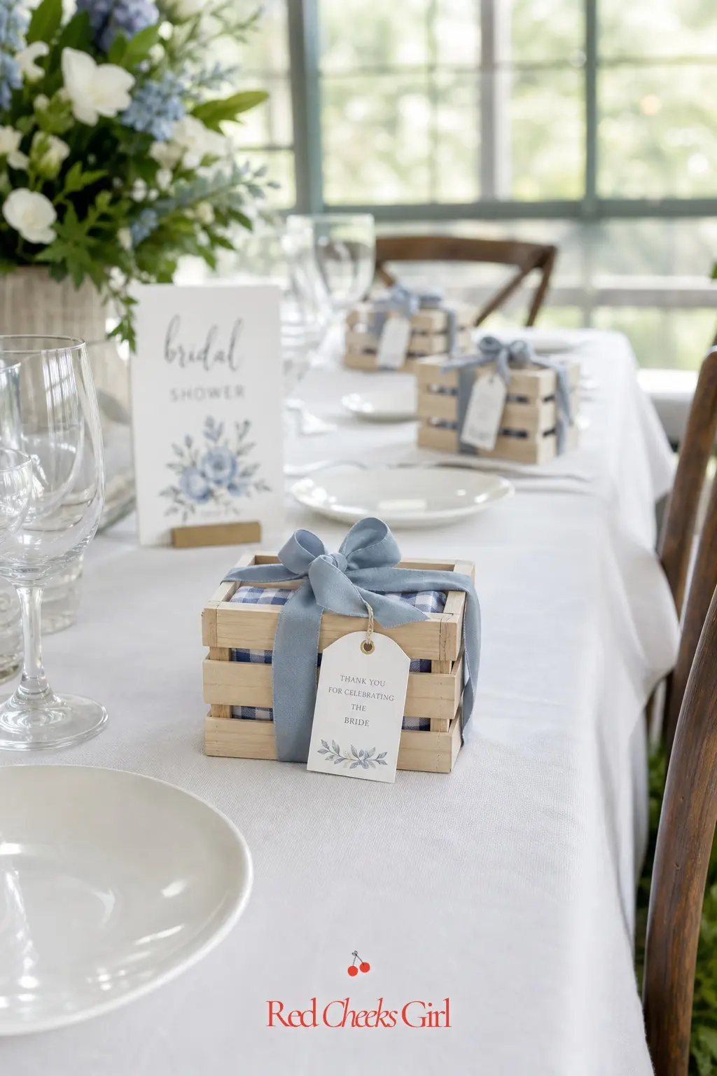 Wooden Crate Place Settings — A miniature wooden crate at each place setting, tied with dusty blue ribbon and holding a small favor, turns the place card into