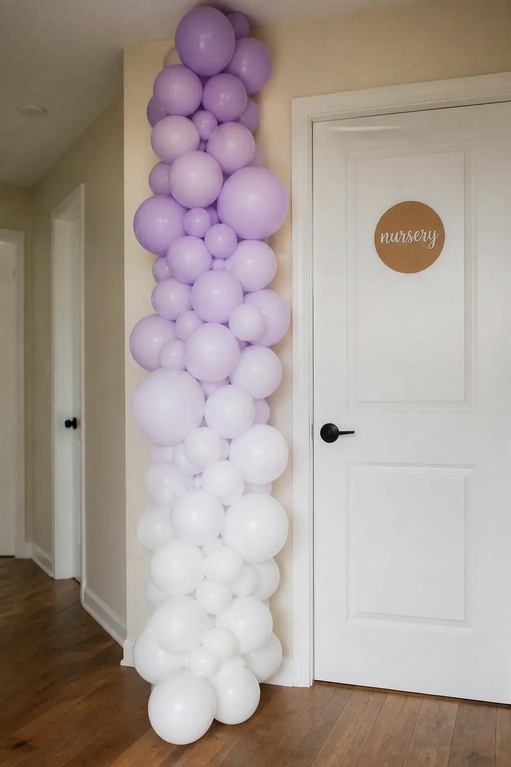 Lilac to White Cascade Beside a Nursery Door — This cascade is not a full arch: it is a one-sided column that runs from ceiling to floor beside a door frame.
