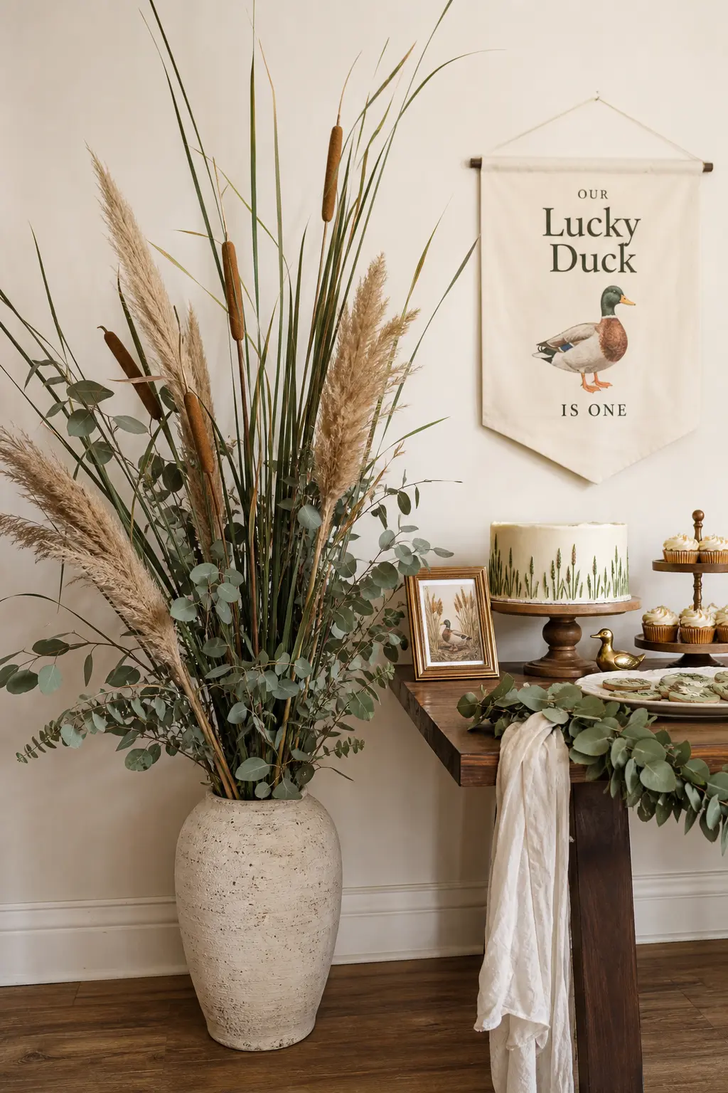 Cattail Floor Vase Arrangement — A single tall vase does more for a bare corner than any amount of balloon filler, and it can move to another room the day