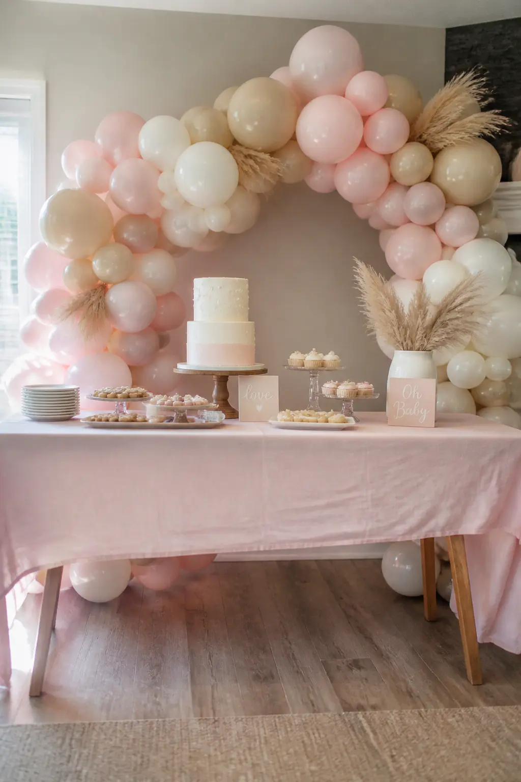 Blush, Cream and Sand Over a Baby Shower Dessert Table — Blush is the warmest of the classic baby pinks and it needs both cream and sand to stop it looking