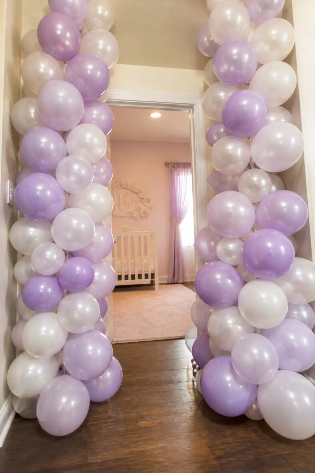 Lilac and Pearl Columns Either Side of a Nursery Doorway — Columns rather than an arch suit a narrow doorway or a low ceiling where an overhead installation