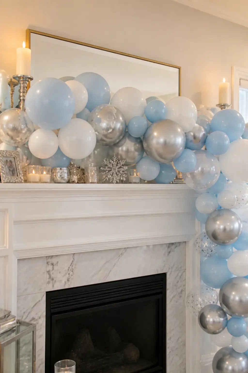 Powder Blue, White and Silver Garland Along a Winter Party Mantel — A mantel garland is the arch format for a room that has no clear focal wall. Pastel balloon