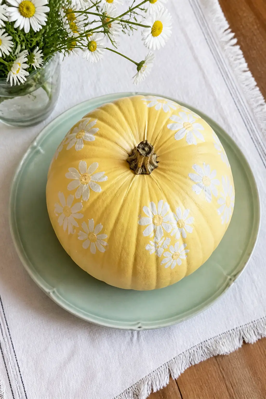 Butter Yellow Pumpkin With White Daisies — Paint the base in flat matte butter yellow. Pastel painted pumpkin