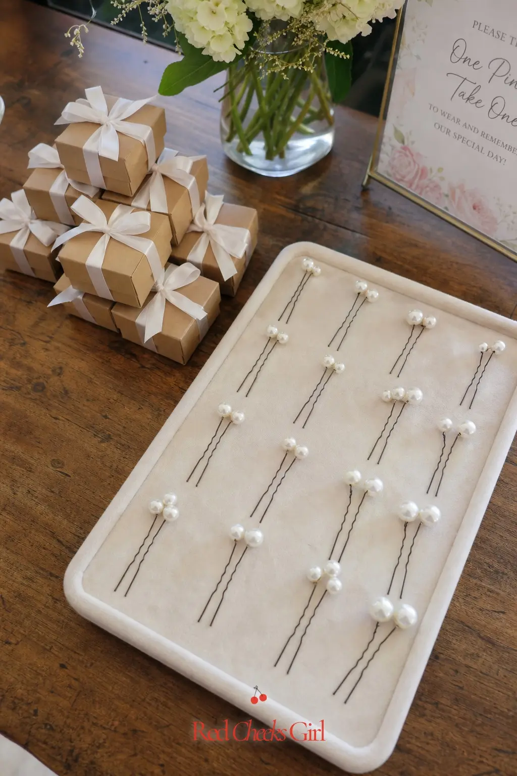 Pearl Hairpin Favor Tray — Small pearl-topped hair pins are wearable long after the shower ends, which makes them a favor guests actually keep instead of