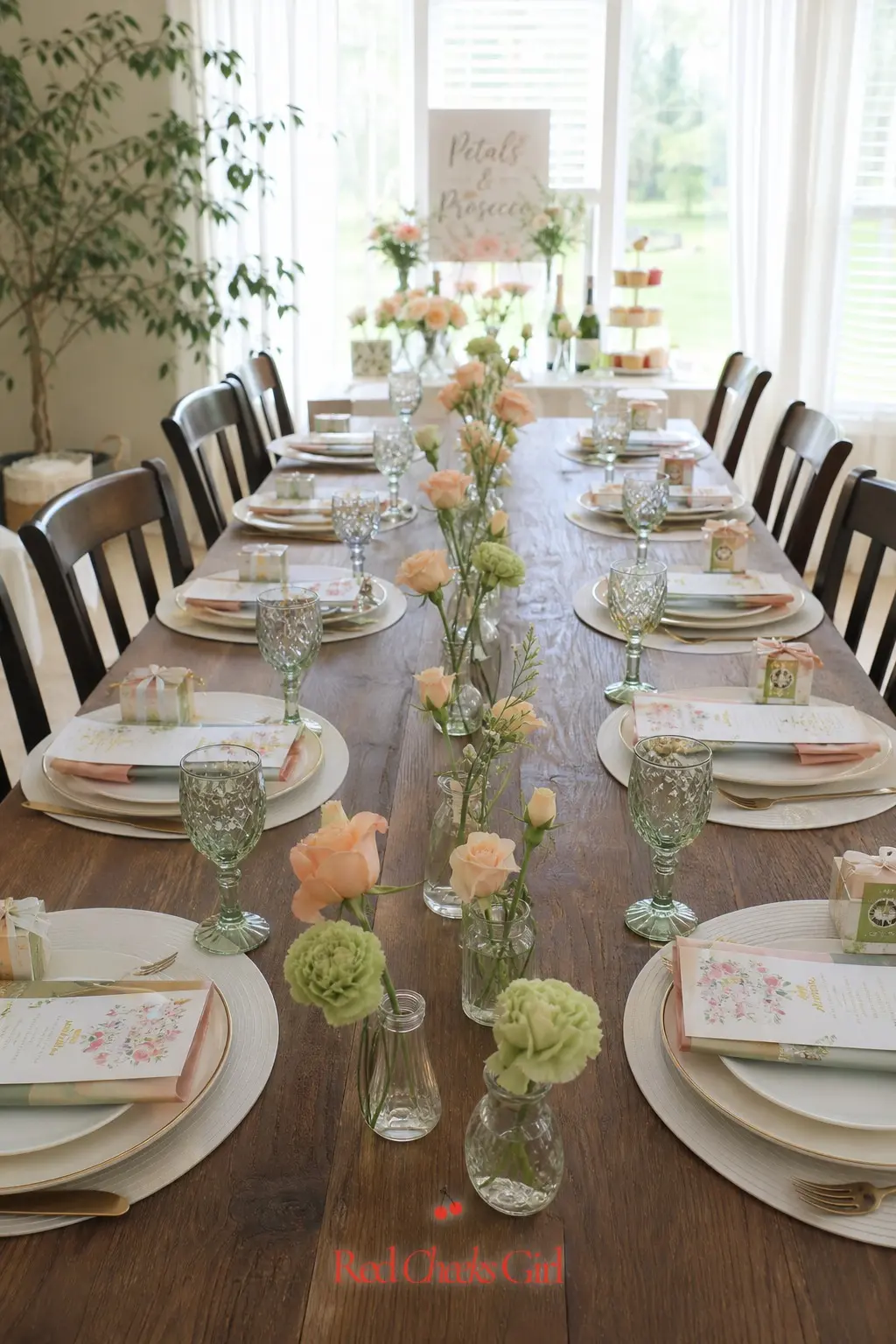 Bud Vase Runway Centerpiece — A row of small bud vases marching down the center of a long table, each holding a single stem, gives more visual length than one