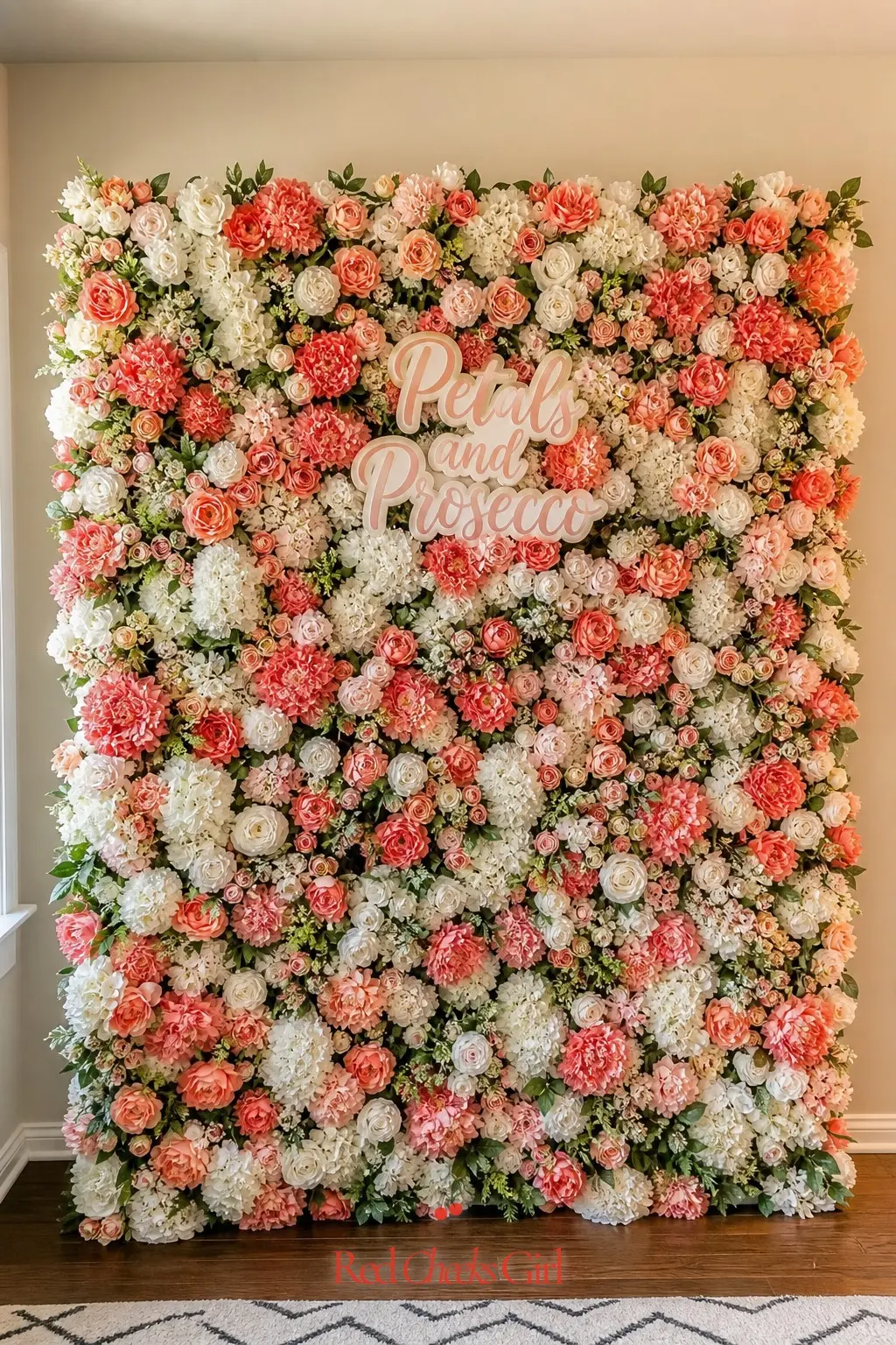 Floral Photo Backdrop Wall — A wall panel covered edge to edge in coral and white blooms gives guests a spot to pause with a drink in hand without anyone