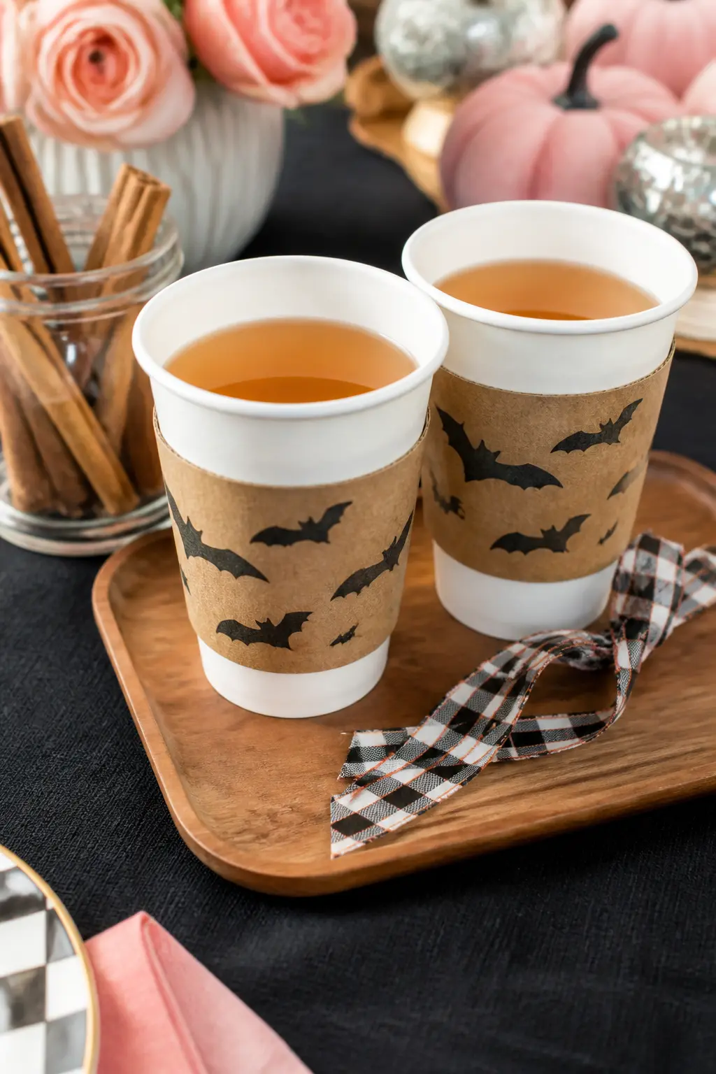 Bat-Print Cup Sleeves for Hot Drinks — Print or buy kraft-paper cup sleeves stamped with small black bat silhouettes and slide them over standard white