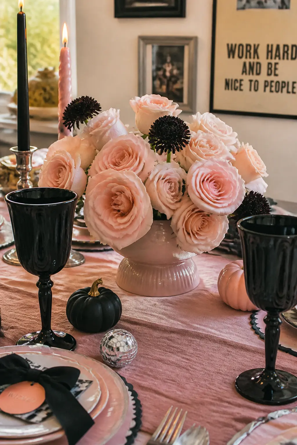 Black Goblet and Pink Rose Centrepiece — Fill a short, wide pink ceramic vase with garden roses in the palest blush available, add two or three stems of