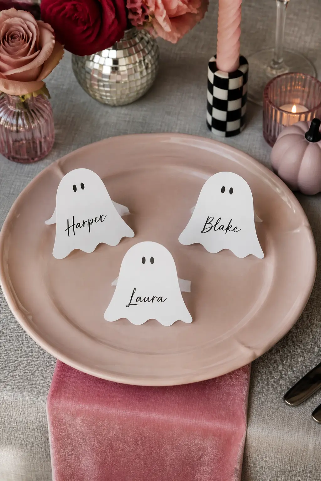 Personalized Ghost Place Cards — Cut ghost shapes from white cardstock using a craft cutter or a simple template and a pair of scissors. Pink halloween