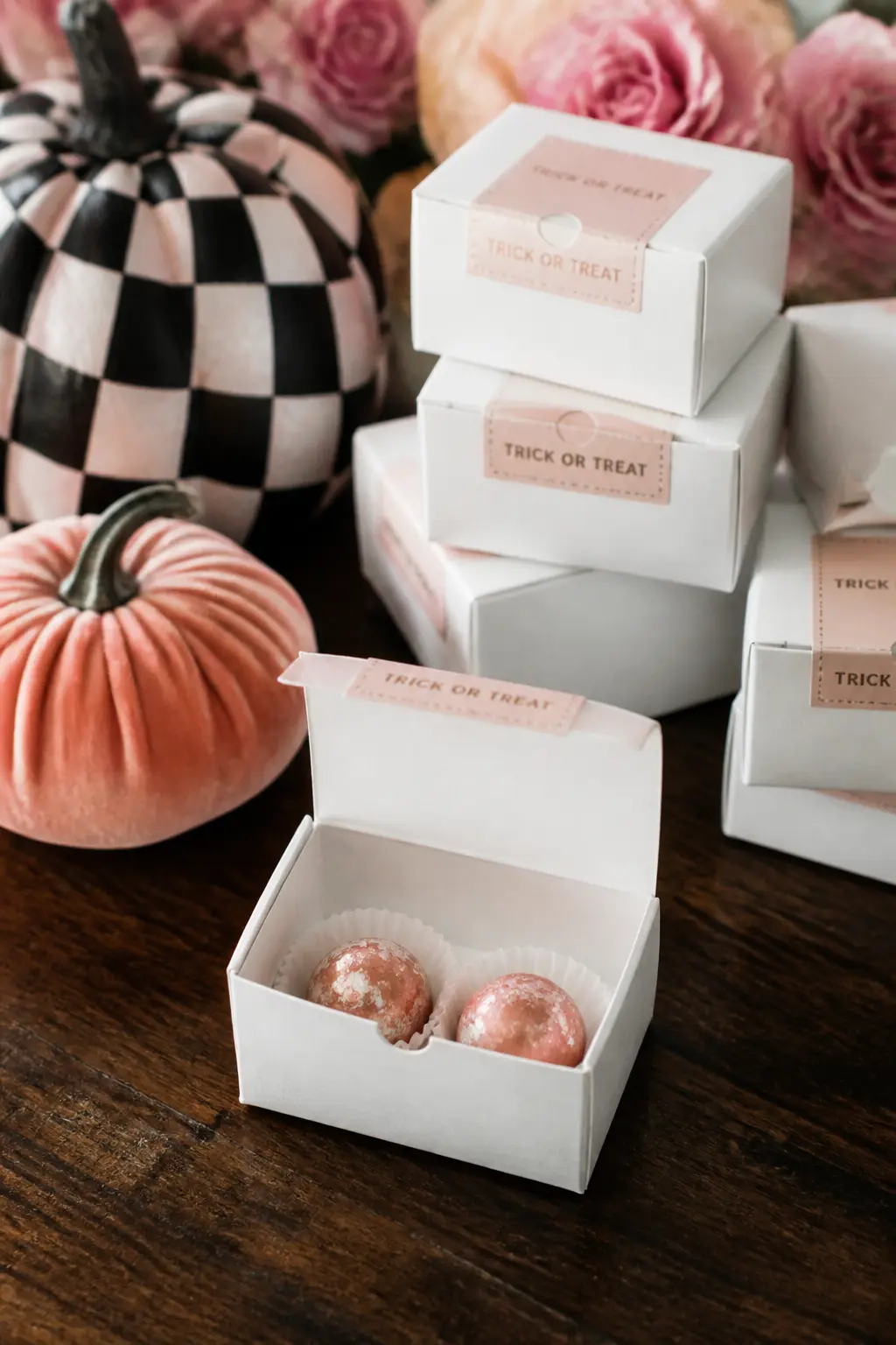 Pink Truffle Treat Boxes — Small hinged truffle boxes in blush or white, filled with two or three store-bought chocolate truffles dusted with pink luster