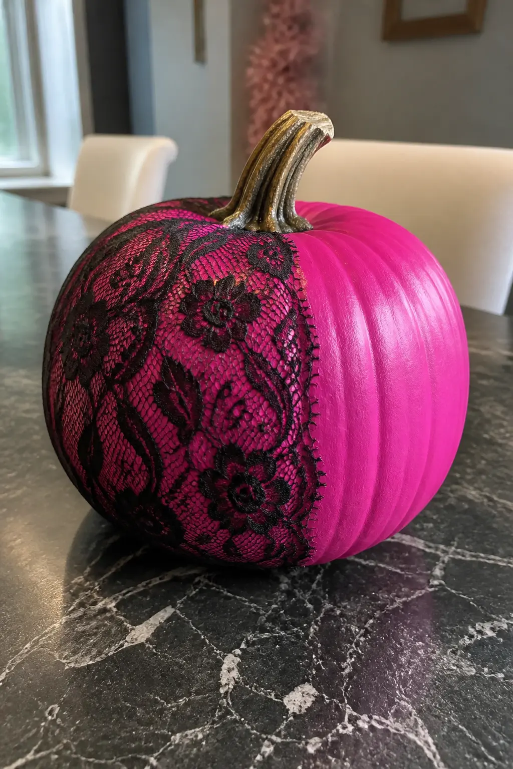 Hot Pink With Black Lace — Cut a piece of black stretch lace large enough to cover half the pumpkin, from stem to base on one side. Pink painted pumpkin