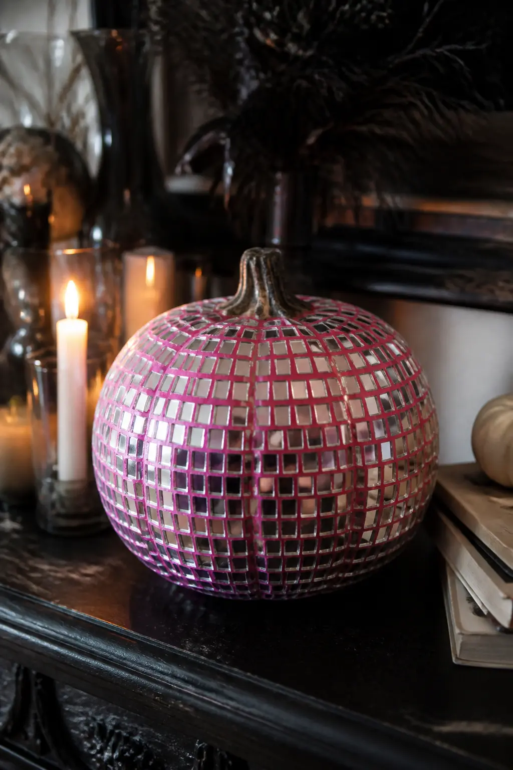 Hot Pink With a Disco Pattern — Cut small squares of mirror card or holographic silver card and glue them across the surface of a hot pink pumpkin in a dense