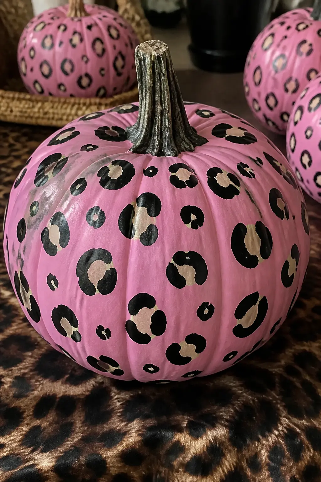 Mid Pink With Leopard Print — Leopard print on a pumpkin sounds like a lot and is actually very controlled: paint the mid pink base, add irregular oval shapes