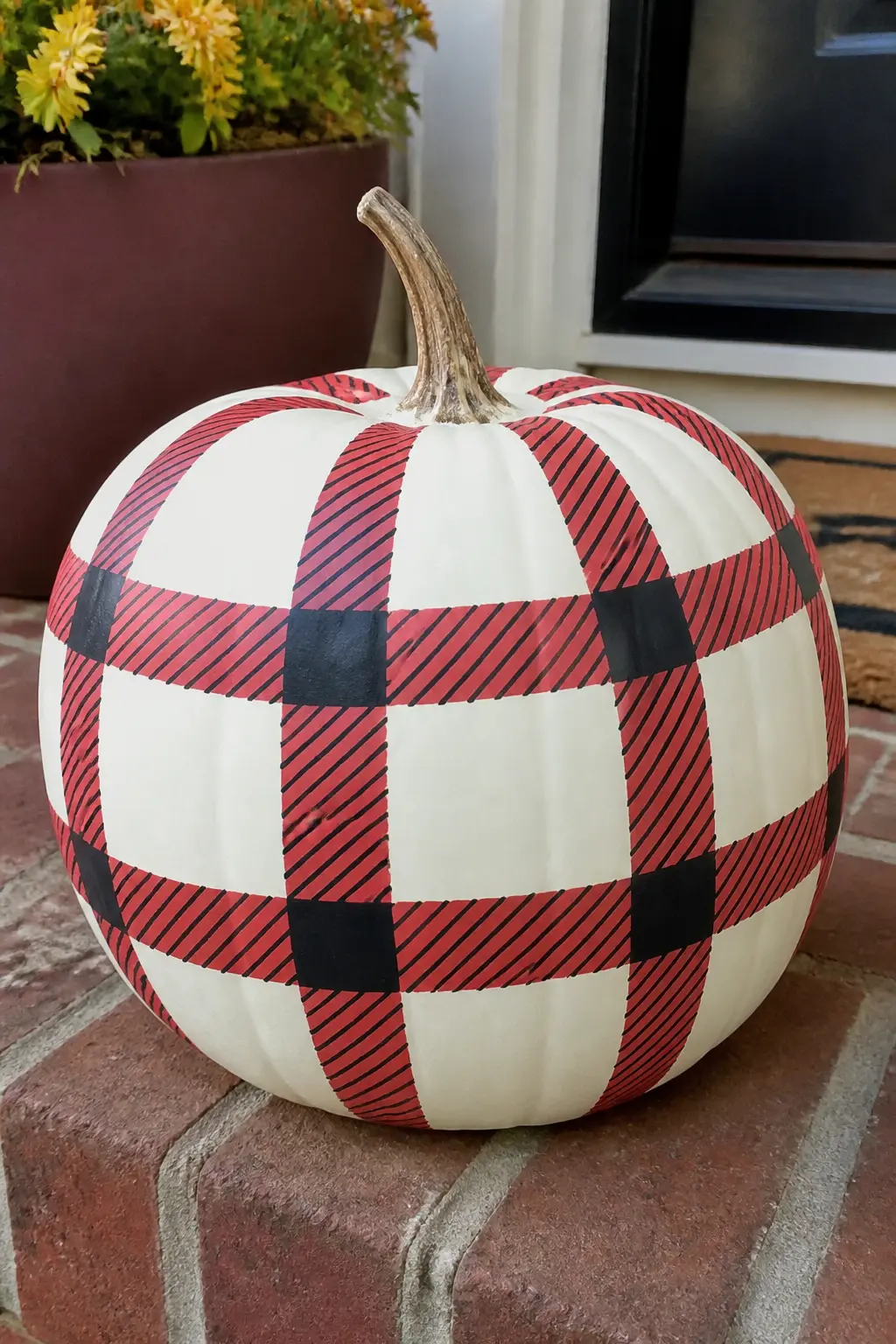 Red and Black Buffalo Check on a White Pumpkin — The classic. Plaid painted pumpkin