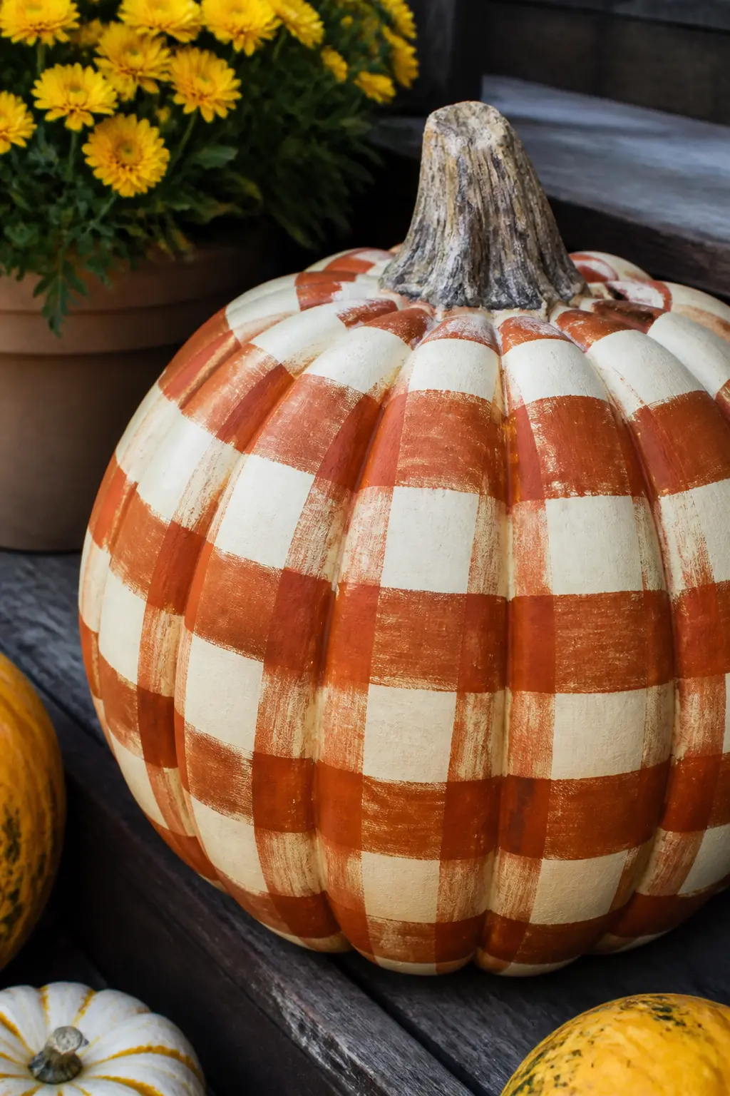 Rust and Cream Buffalo Check on a Cream Pumpkin — A cream base coat keeps this warm rather than stark. Plaid painted pumpkin