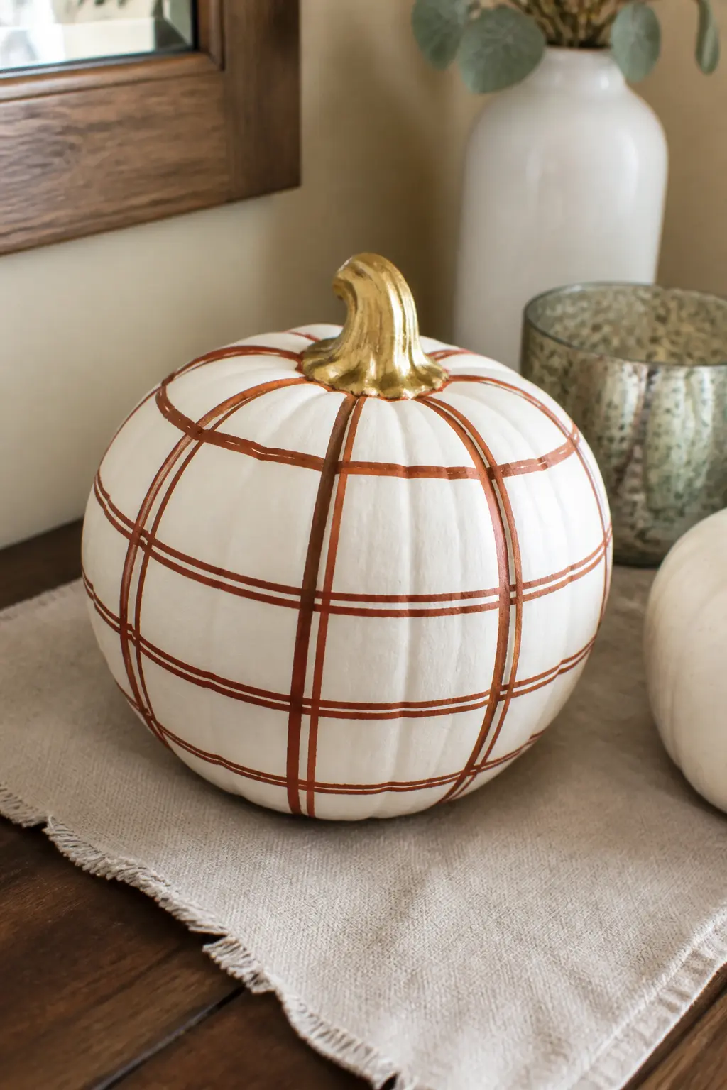 Rust Windowpane Grid With a Gold Stem on a Cream Pumpkin — Rust lines on a cream base are warm and close in tone, so the windowpane pattern here is quiet and