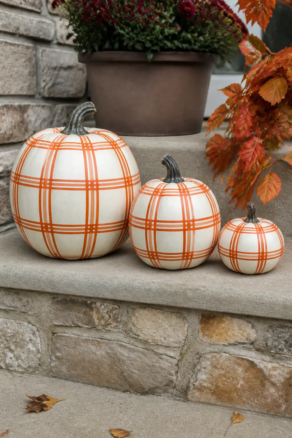 Set of Three Pumpkins in Matching Rust Plaid, Graduated Sizes — Three pumpkins in the same rust plaid, in small, medium and large, work as a single display
