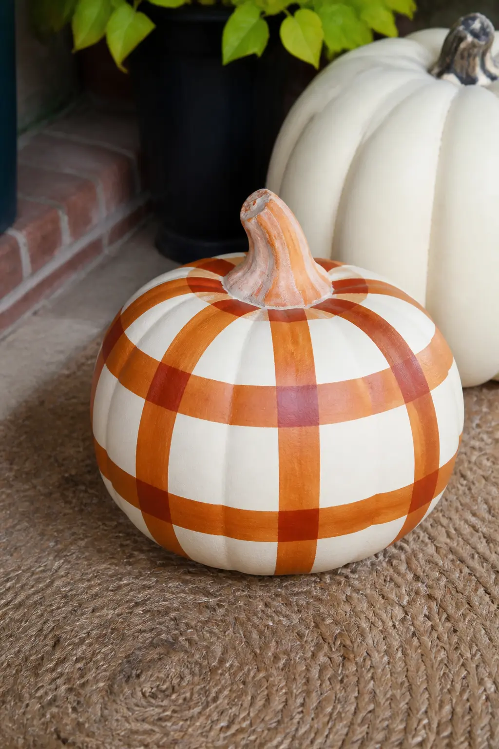 Two-Tone Rust Gingham on a Cream Pumpkin — Two-tone rust gingham uses a burnt orange for the stripes and lets the crossing squares create a deeper, almost