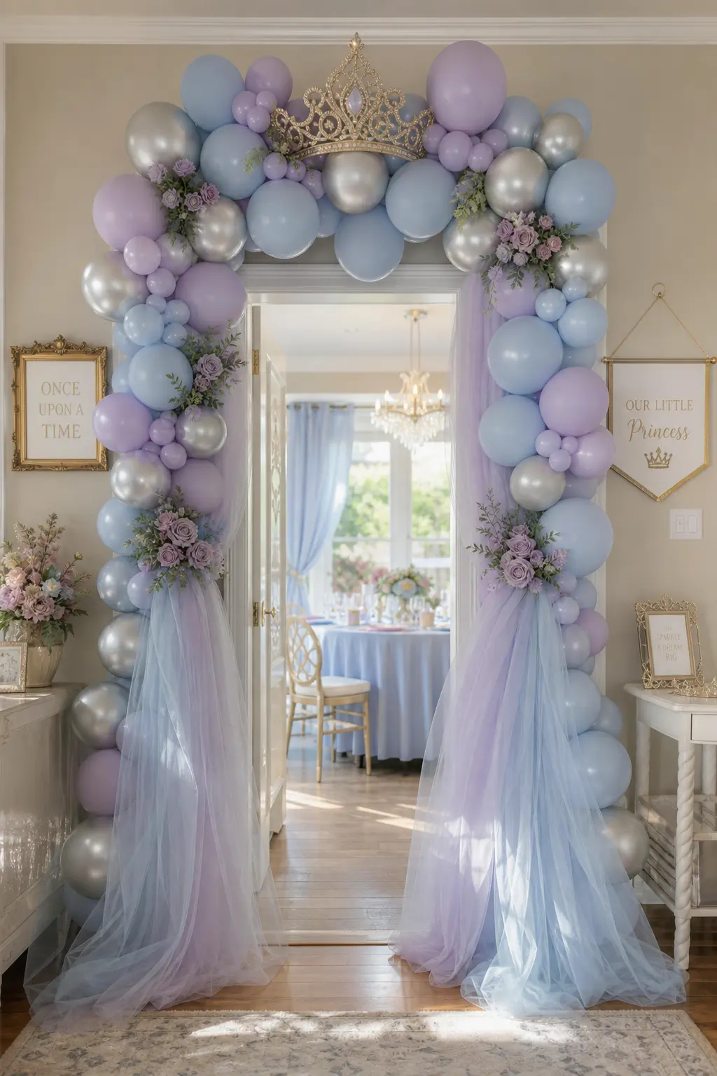 Dusty Blue Balloon Doorway — A doorway framed in a dusty blue, lilac and silver balloon arch gives the photo zone a natural frame without needing a second big