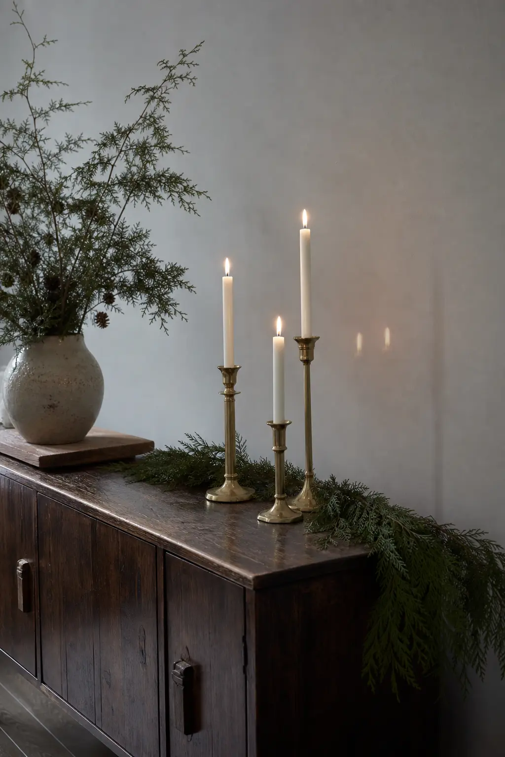 White Candles in Plain Brass