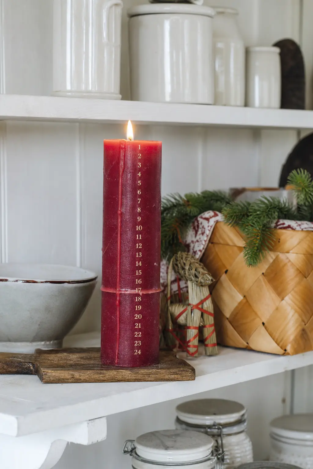 A Wooden Advent Candle Marked in Days