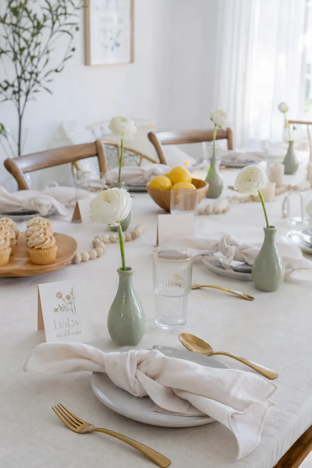 One Flower Variety in Bud Vases Repeated at Every Place Setting