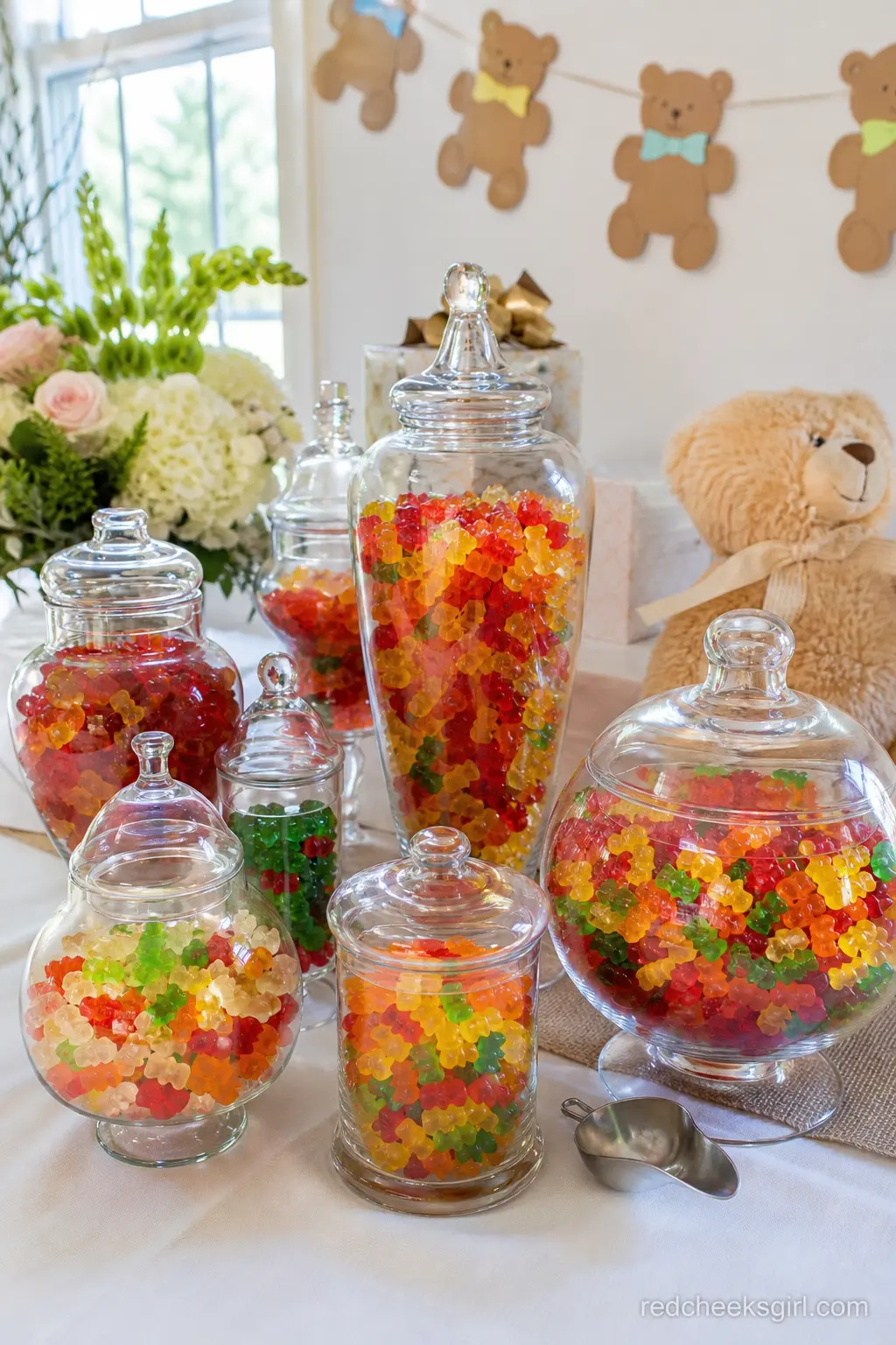 Gummy Bear Candy Buffet — Glass apothecary jars filled with gummy bears in every color, lined up on a buffet table, is the one spot on this list where the