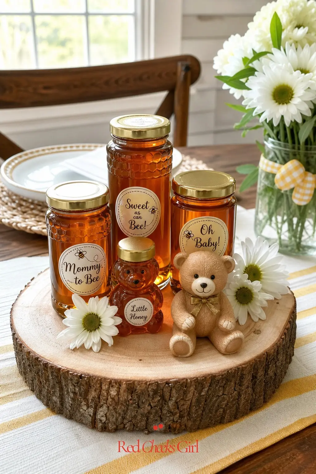 Honey Jar And Wood Slice Centerpiece — A raw wood slice as a base, topped with a cluster of amber honey jars and a small seated bear, is the kind of