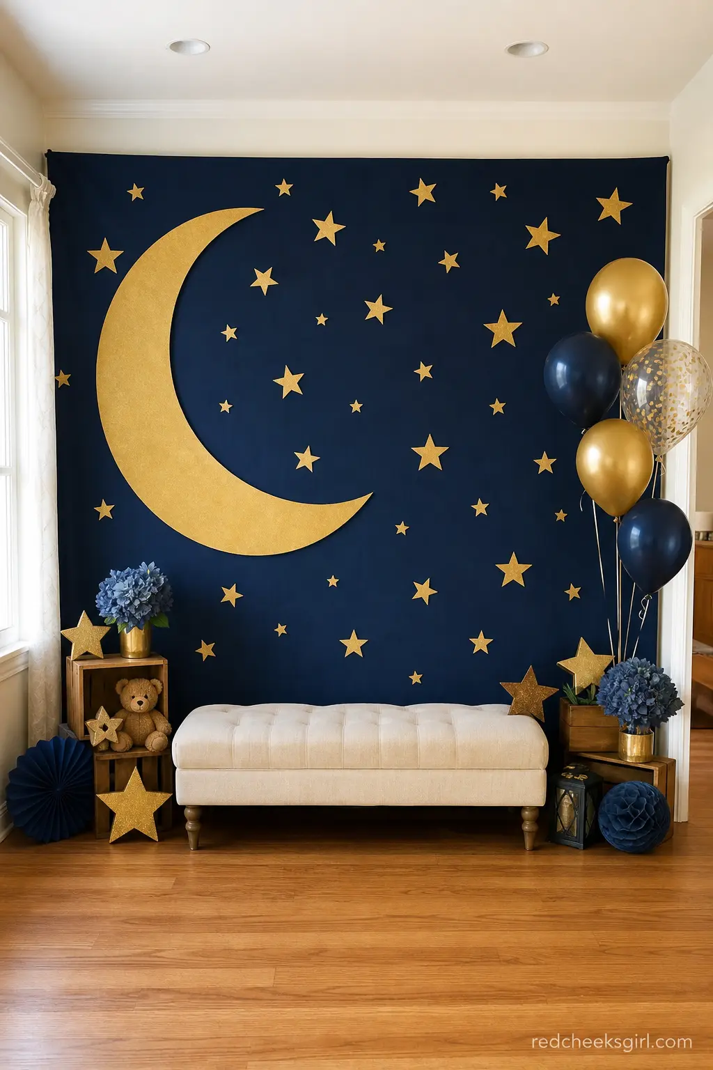 Navy and Gold Photo Backdrop — A wall of deep navy scattered with gold stars and one large crescent moon becomes the default photo spot for the whole party.