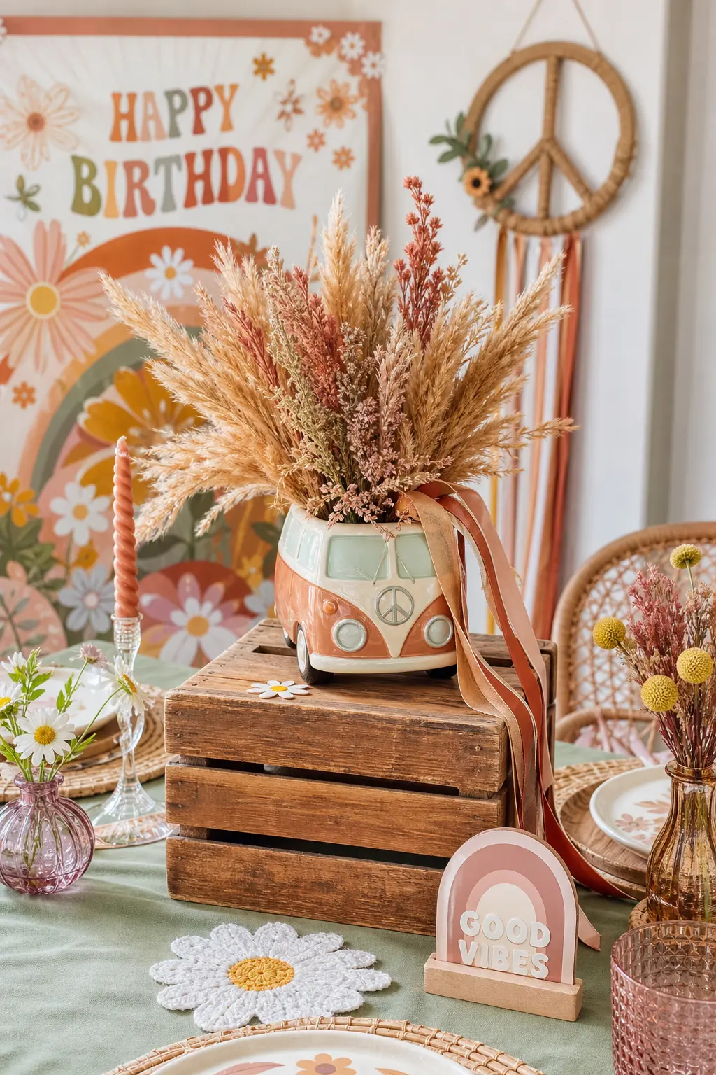 Vintage Van Vignette Centerpiece — A stack of wood crates becomes a low display for a small ceramic van shaped vase filled with dried pampas, wrapped in a