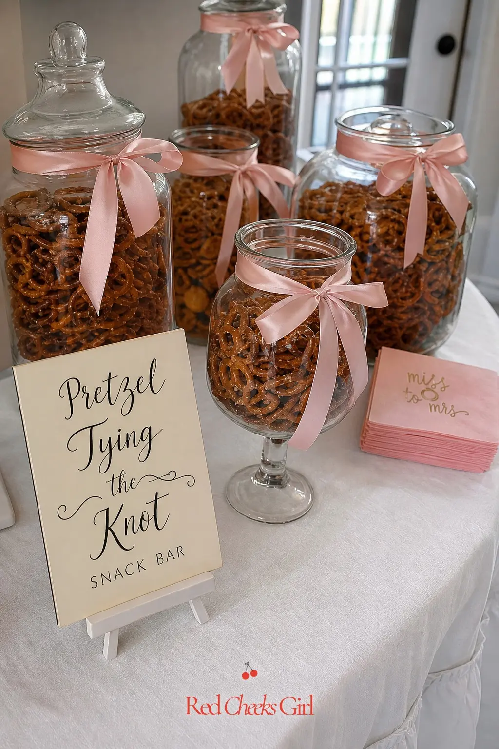 Pretzel Tying the Knot Snack Bar — Pretzels are the theme's built-in punchline: a twisted knot of dough that says the pun without needing a sign at all. Tying