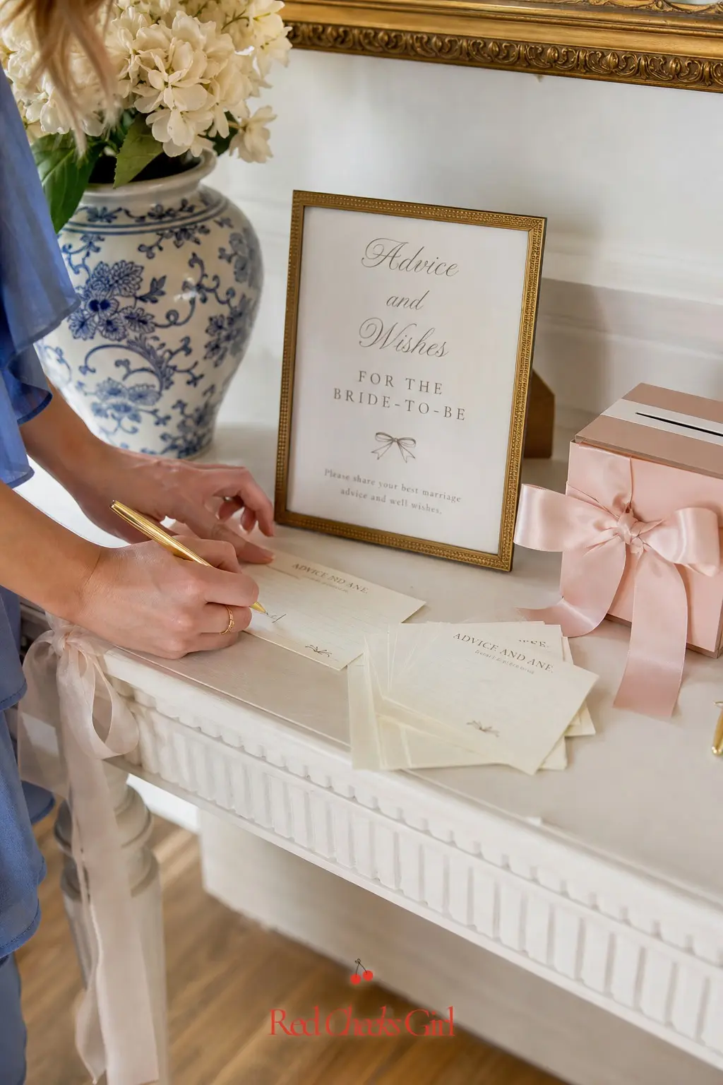 Ribbon-Tied Advice Card Station — A stack of blank cards and a jar for finished notes gives guests something to do with their hands while they wait for food