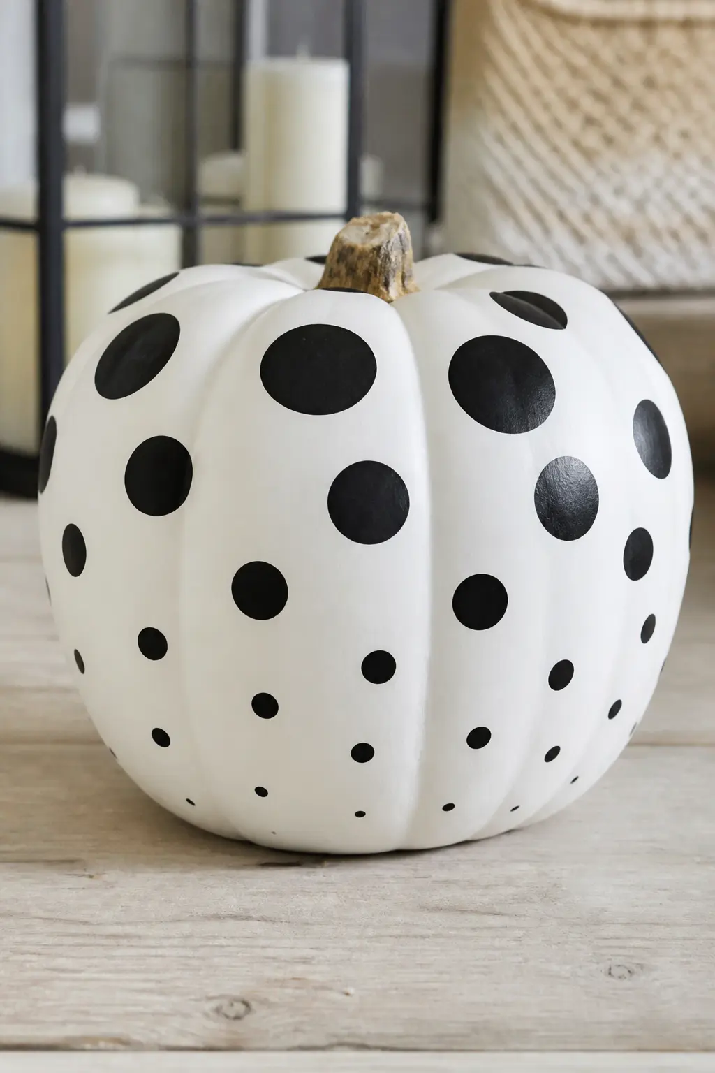 Black Polka Dots in Graduated Sizes — Polka dots in three graduating sizes, large near the top, medium in the middle band, small toward the base, give the