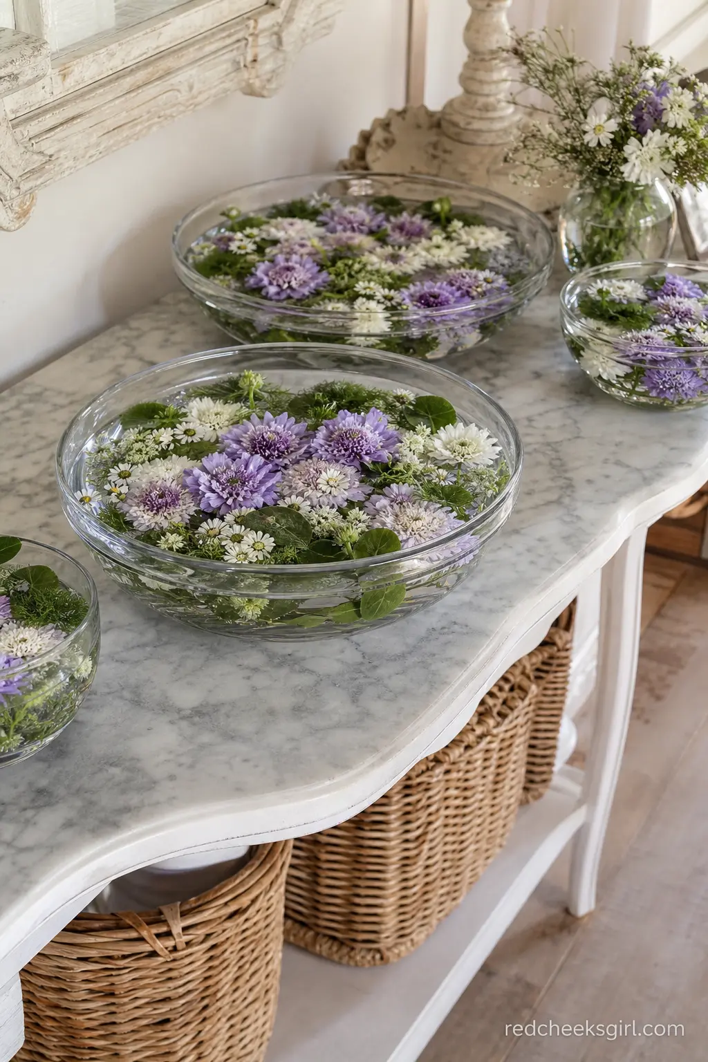 Floating Wildflower Bowls — Snip the heads off a bunch of wildflowers and float them in a wide, shallow bowl of water: it is the fastest centerpiece on this
