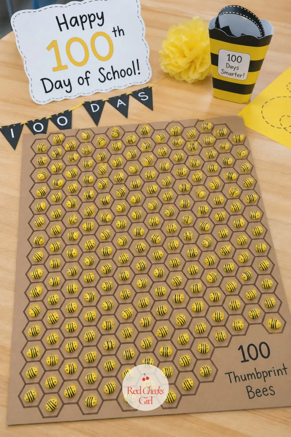 The 100 Thumbprint Bees on a Honeycomb — Draw or paint a brown hexagon honeycomb pattern across the poster board first, since the comb takes longer to dry than