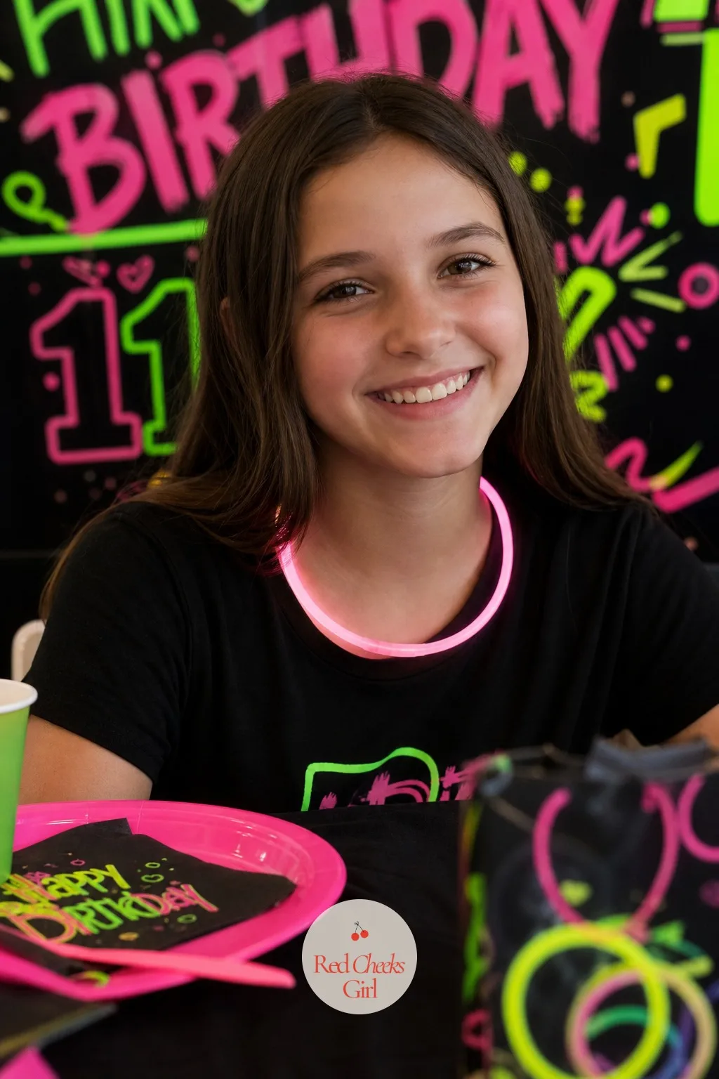 Glow Stick Necklaces at Each Place Setting — She sees her name on a seat and a glow stick necklace curled beside the plate before anyone says a word, and that