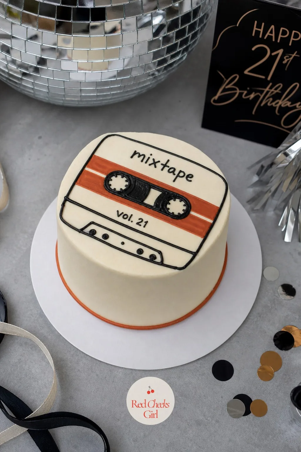 Mixtape Bento Cake — For the friend whose whole personality is a playlist, a small cake iced flat like a cassette label says it louder than a cake topper ever