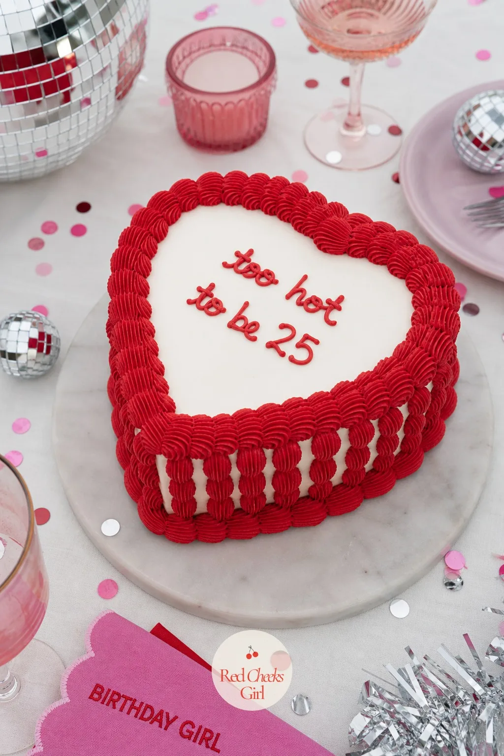 Heart-Shaped Lambeth Cake With A Cheeky Message — A round cake says birthday. 25th birthday cake