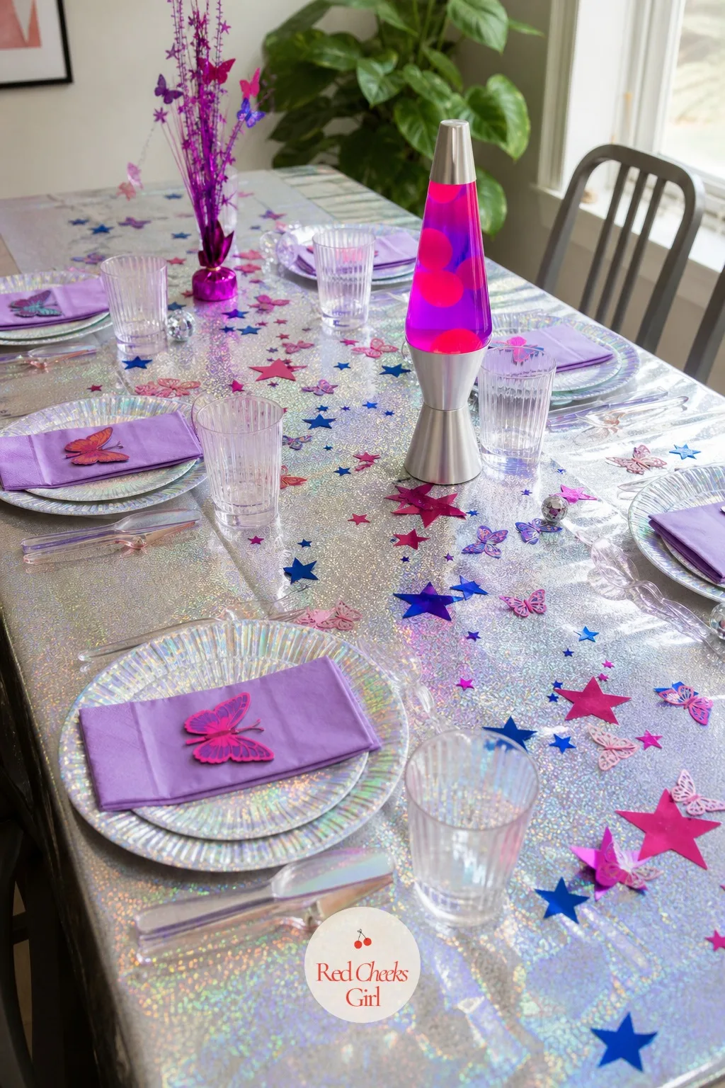 Y2K Throwback Glitter and Butterfly Table — For the guest list that grew up on butterfly clips and low rise jeans, this is the one that gets photographed from