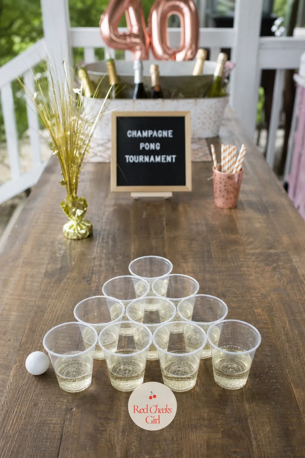 Champagne Pong Tournament — Beer pong belongs to a different decade, so give the same table and the same nerve a glass of something she actually drinks now.