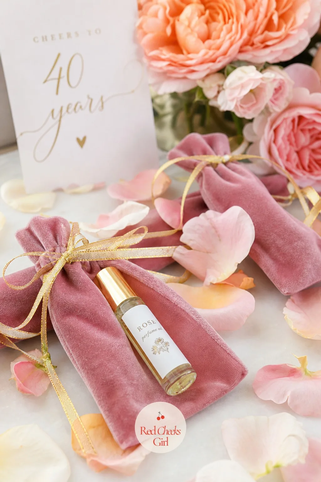 A Travel-Size Perfume Oil Favor in a Velvet Pouch — A favour she can actually use on a Tuesday beats one that sits in a drawer, and a tiny vial of scent clears