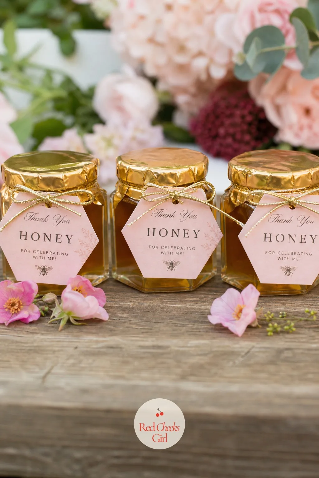 Small Jars Of Honey With A Gold Tag — Something sweet to take home feels right at a party built around abundance. 75th birthday ideas for mom