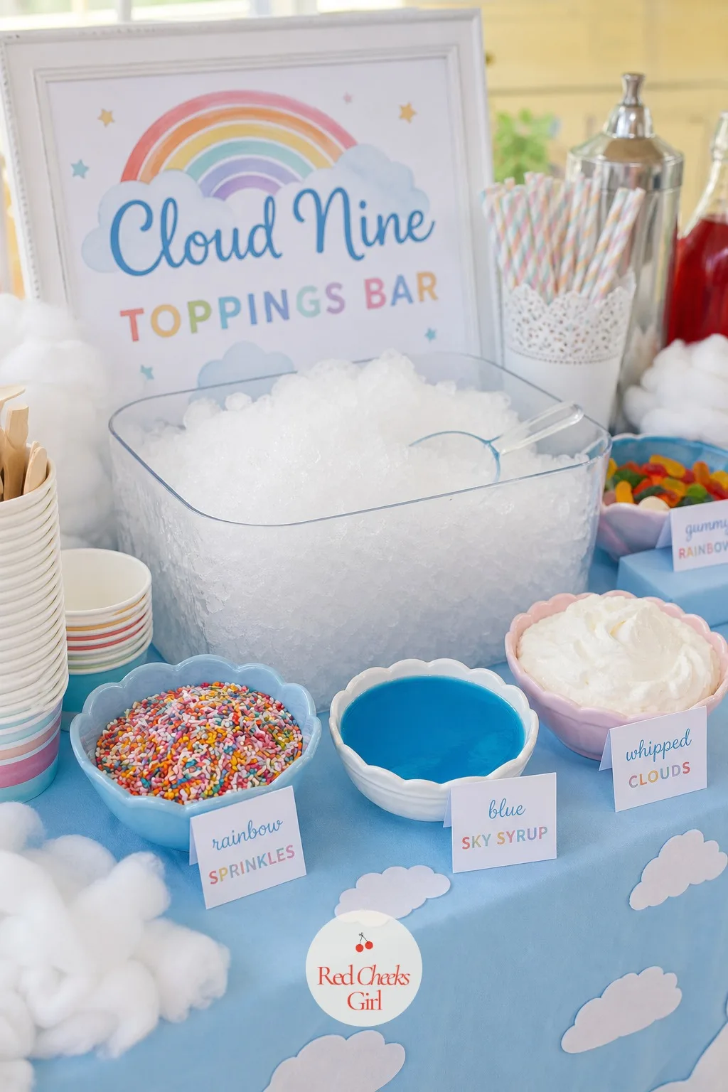 An Ice Cream and Snow Cone Toppings Bar — A tub of shaved ice or a tiered stand of ice cream scoops sits at the center, with small bowls ringed around it
