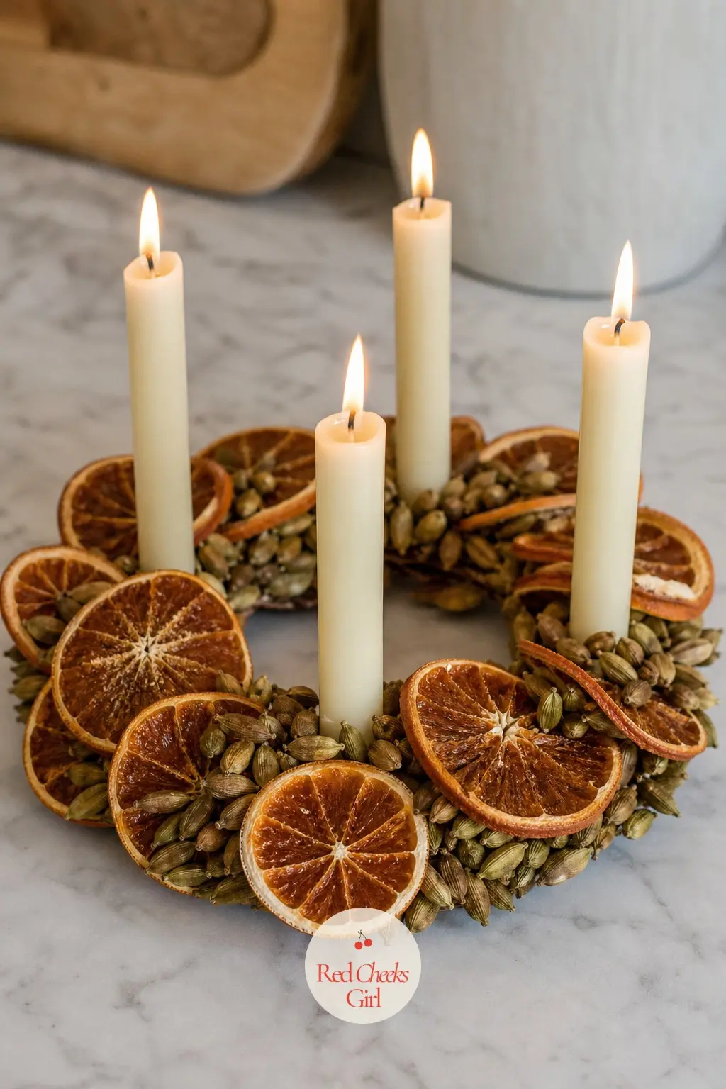 A Dried Orange Slice and Cardamom Pod Ring for the Kitchen Island — Scaled down to fit a kitchen island without blocking the cutting board, this ring strings