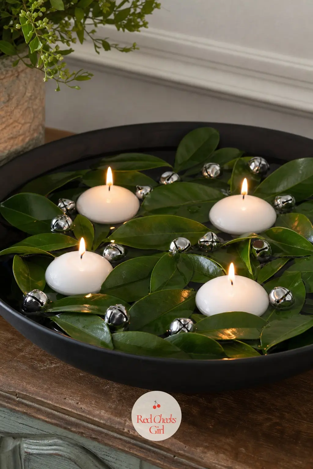 A Floating Four-Candle Bowl Ring With Gardenia Leaf and Silver Bells — This one drops the wreath shape entirely. Advent wreath ideas