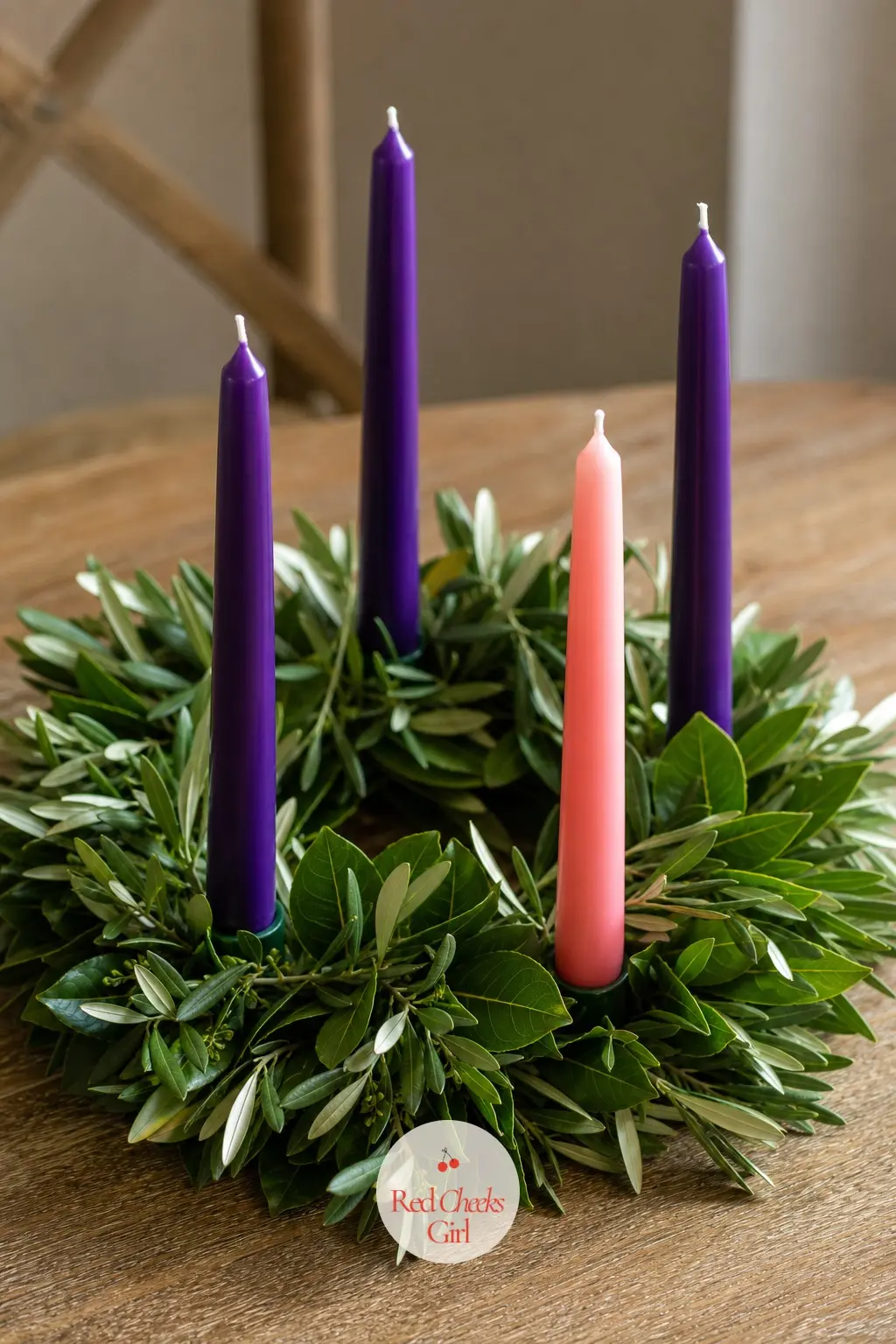 Three Purple Tapers and One Rose Candle on a Bay Leaf and Olive Branch Ring — This is the traditional code, purple, purple, rose, purple, but set into fresh