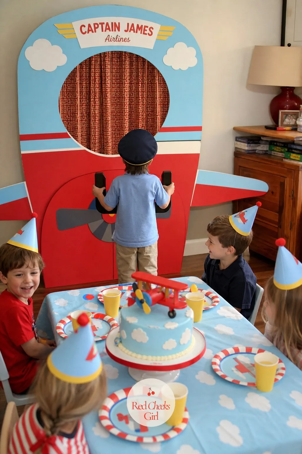 Cardboard Cockpit Photo Corner — Once the hat and the badge are on, she needs somewhere to actually be a pilot, and a flat cardboard cockpit against the wall