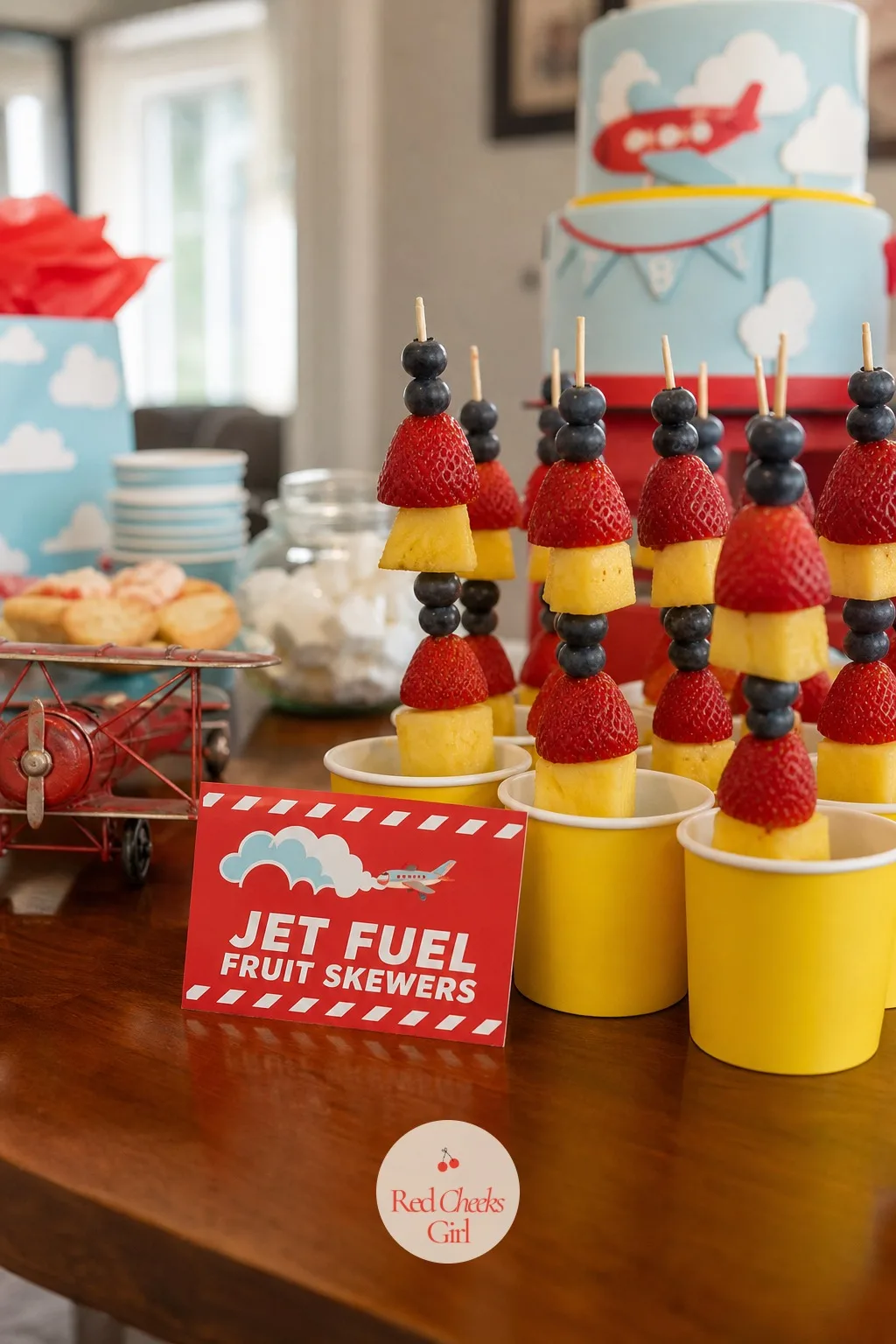 Jet Fuel Fruit Skewers — Fruit on a stick is already a party staple, so the only change here is where it stands. Airplane themed birthday party