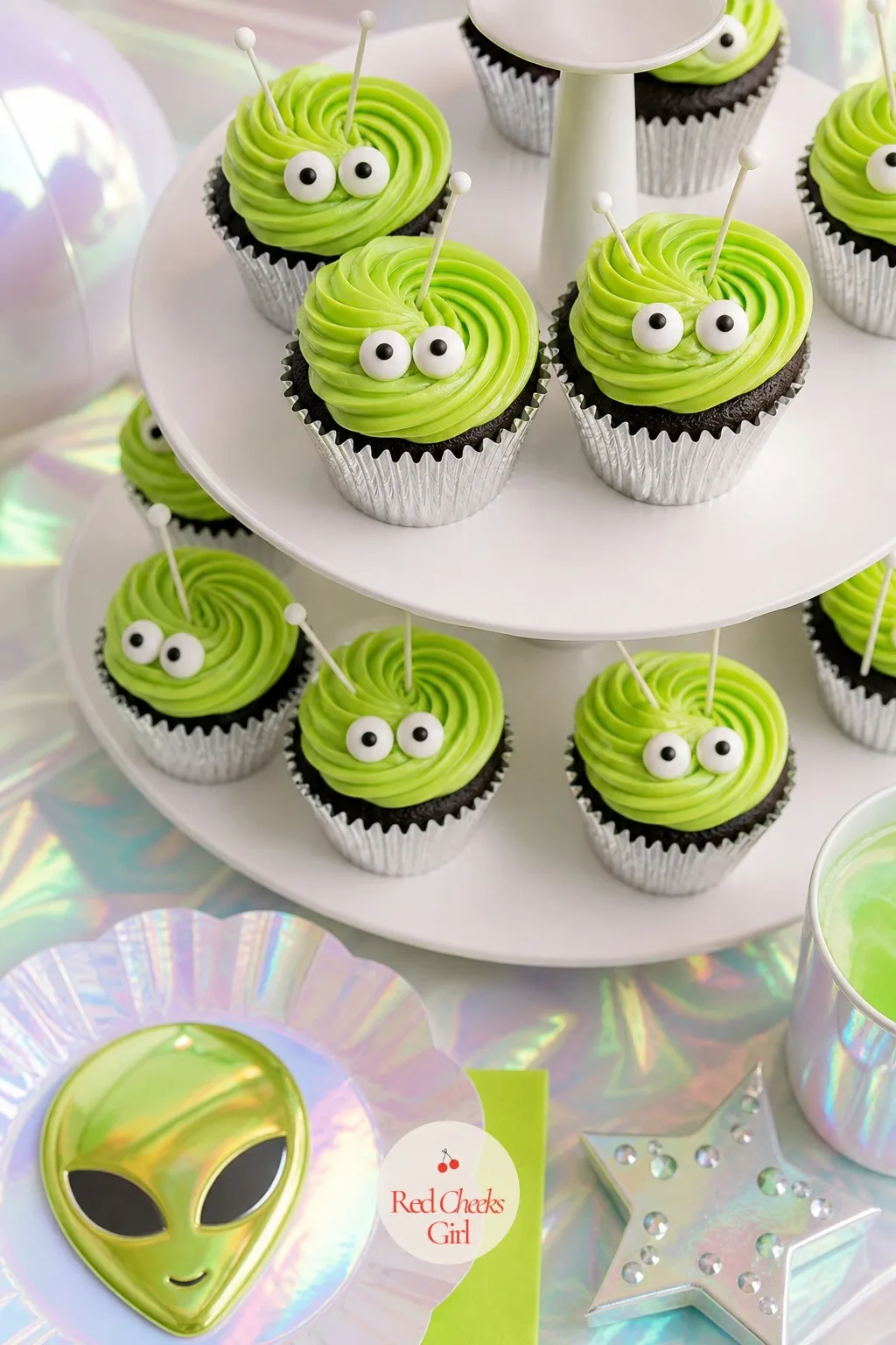 Green Alien Cupcakes — Standard cupcakes on a themed table always look like they wandered in from a different party. Alien first birthday party